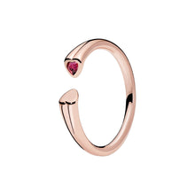 Load image into Gallery viewer, Rose gold ring with a heart-shaped gemstone on a white background