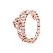Load image into Gallery viewer, Rose gold ring with a diamond on a white background