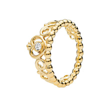 Load image into Gallery viewer, Gold ring with intricate design and diamond on a white background