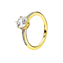 Load image into Gallery viewer, Gold ring with a clear gemstone on a white background