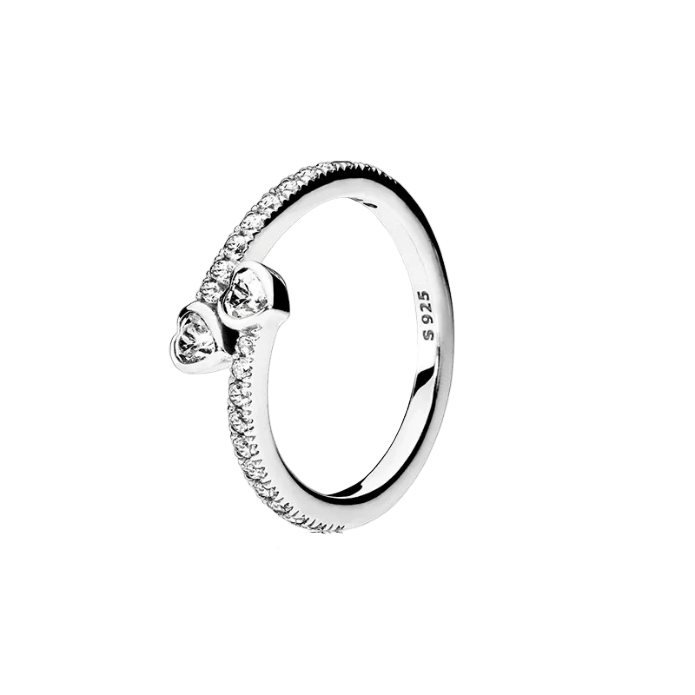 Silver ring with a small diamond on a white background