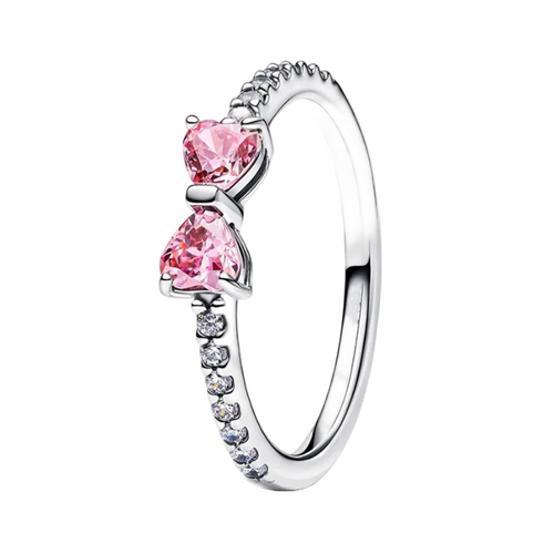 Silver ring with pink heart-shaped stones on a white background