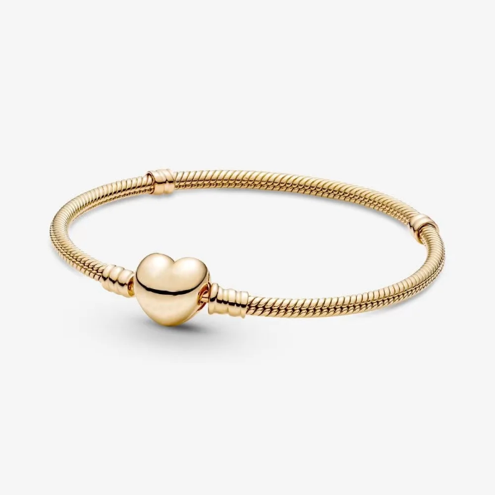 Gold bracelet with a heart-shaped clasp on a white background