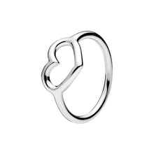 Load image into Gallery viewer, Silver heart-shaped ring on a white background

