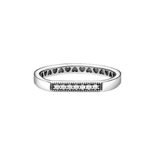 Load image into Gallery viewer, Silver ring with heart and diamond designs on a white background
