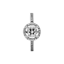 Load image into Gallery viewer, Silver pendant with a large central gemstone and smaller stones around on a white background
