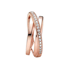 Load image into Gallery viewer, Rose gold ring with diamond accents on a white background
