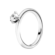 Load image into Gallery viewer, Silver ring with a clear gemstone on a white background
