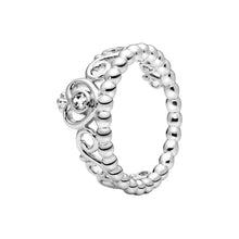 Load image into Gallery viewer, Silver ring with a small diamond on a white background
