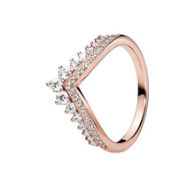 Load image into Gallery viewer, Rose gold ring with diamond accents on a white background
