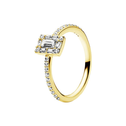 gold ring with emerald-cut diamond and smaller diamonds on a white background stone