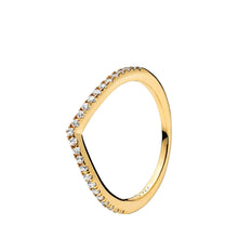Load image into Gallery viewer, Gold ring with small diamonds on a white background
