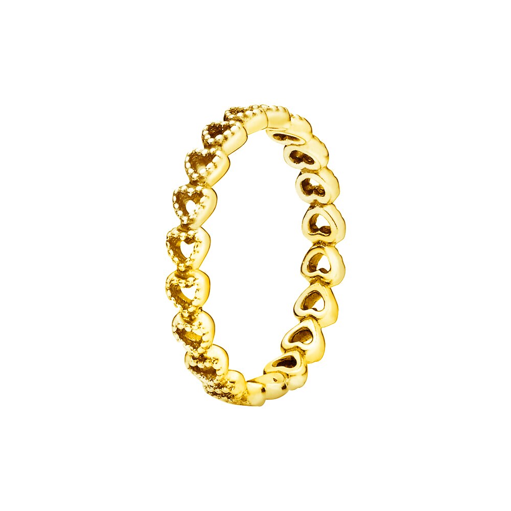 gold ring with little heart shapes
